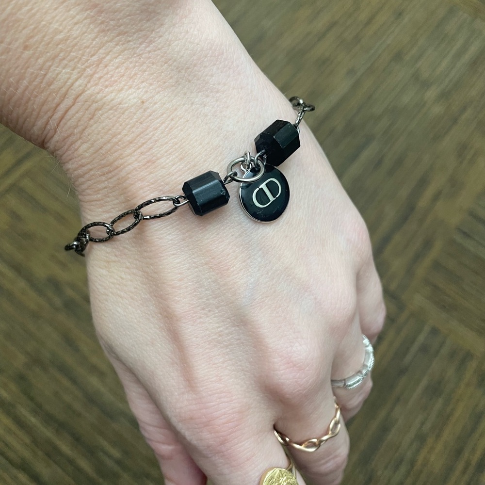 silver bracelet with designer charm handmade